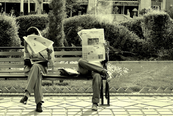 reading newspaper reading a newspaper