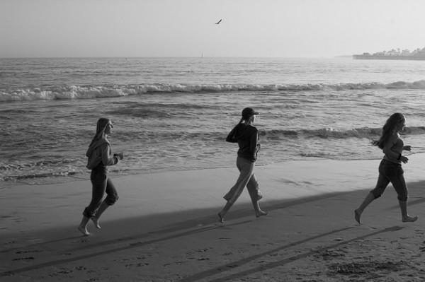 girls running on the beach girls running on the beach
