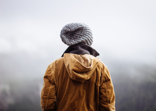 millennial in a hat and jacket