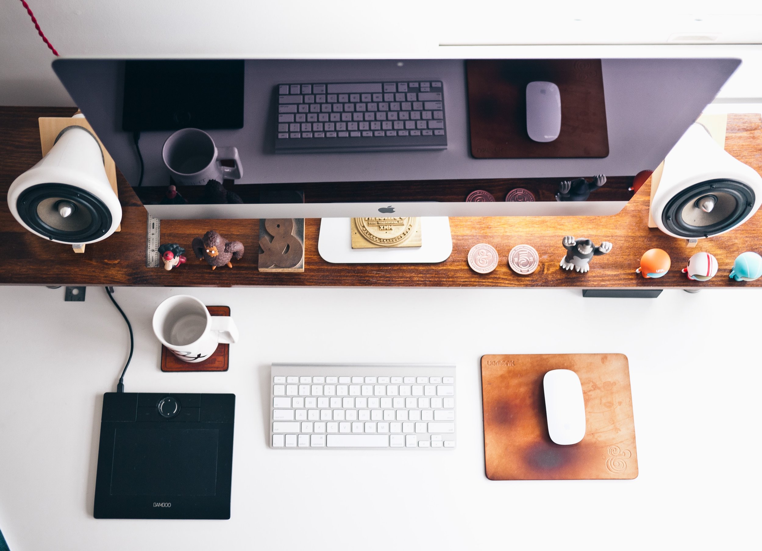 Sleek workspace with tech and unique items, epitomizing personalized productivity.