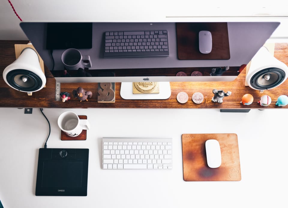 Sleek workspace with tech and unique items, epitomizing personalized productivity.